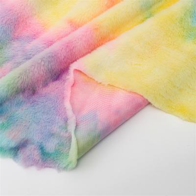 China Anti-rust Processing Factory New Rainbow Rabbit Plush Fabric Soft Faux Fur Fabric Long Pile For Plush Toy Cloth for sale