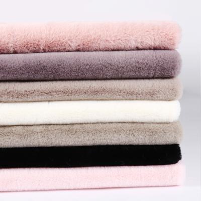 China Wholesale Soft And Skin-Friendly 100% Custom Polyester Knit Stripe Long Pile Stock Lot Plush Faux Rabbit Fur Fabric for sale