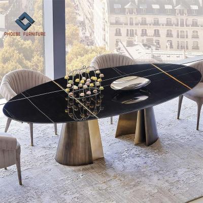 China Luxury Oval Marble Veneered Wood Dining Table With Bronze Metal Base Legs for sale