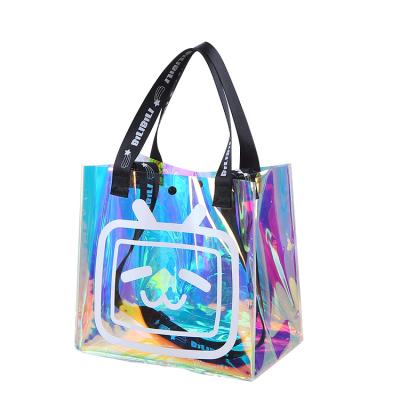 China Customized Fashion Symphony Laser Portable Transparent PVC Bag Fashion Women Travel Makeup Bags Cosmetic Bag for sale