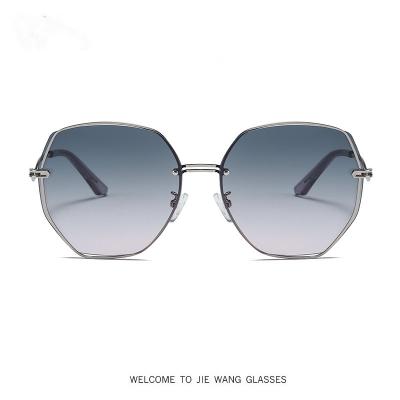 China 2022 Classic Men's Fashion Ladies Fashion Polygon Unisex Retro Irregular Glass Octagonal Sunglasses Small Sun Glasses for sale