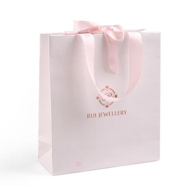 China Boutique Design Biodegradable Luxury Pink Paper Bags Recyclable Eco Friendly Packaging Cute Custom With Logo for sale