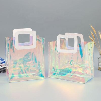 China Hot Selling Recyclable Clear PVC Tote Bag Holographic Handle PVC Gift Bag for sale