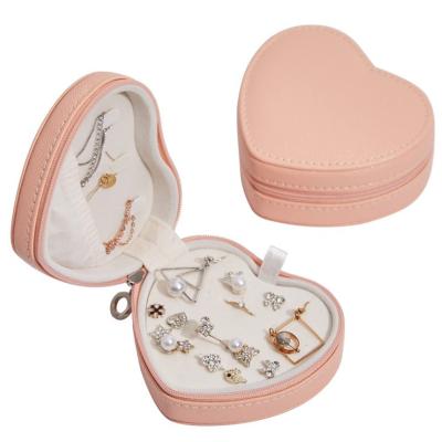 China Sustainable Heart Shape PU Material Necklace Ring Earring Portable Jewelry Box Jewelry Storage Box for sale