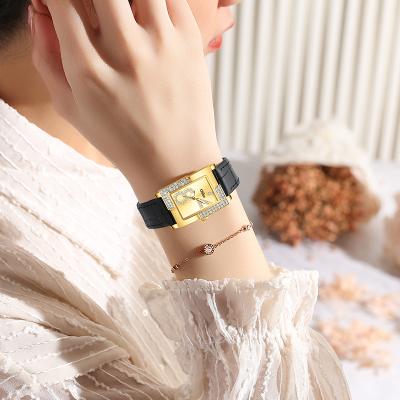 China Automatic Charm Rose Quartz Gold Leather Strap Watch Quartz Dial Square Date Fancy Wrist Watched Ladies Iced Out Watch for sale