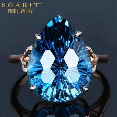 China SGARIT 18k Real Gold Pear Ring Jewelry Wholesale Single Natural Blue Topaz Ring Women 12ct London Stone TRENDY Big Jewelry for sale