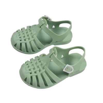 China Latest Round Girls Fashion Soft Sandals Kids Casual Solid Color Buckle Strap Cutout Sandals for sale