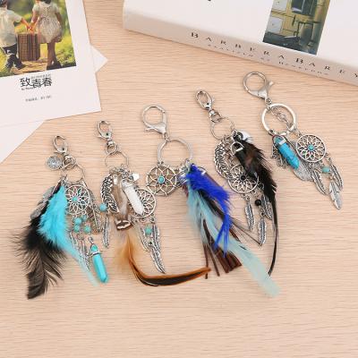 China Metal Dream Catcher Key Chain Charm Pom Pom Tassel Keychain Girl Women with Gemstone Hamasa Hand Dream Catcher Metal Key Chain Charms for sale