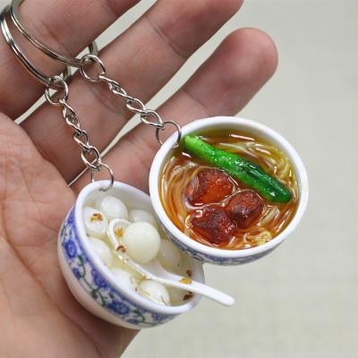 China 3D PVC food key chain PVC simulation donut noodle key chain cute delicious porcelain Chinese blue and white food accessories key chain for sale