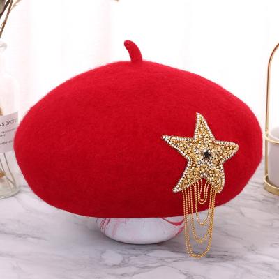 China JOINT Designer Vintage Wool Winter Women Beret Hats Rhinestone Chain Tassel Star Ladies Beret Hat for sale