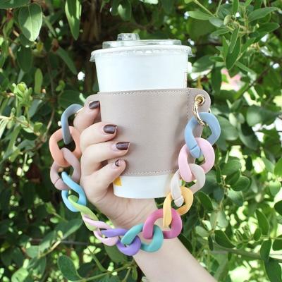 China Durable Leather Cup Sleeve Insulated Cup Coat Beauty Water Bottle Holder Carrier Cup Accessories Packaging Cup With Buckle Lanyard for sale