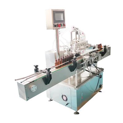 China Food 4 Head Filling Machine Essential Oil 30ml Bottle Filling And Capping Machine for sale