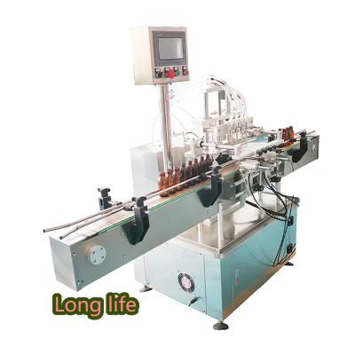 China Food 10ml 30ml Automatic Liquid Essential Oil Bottle Filling Seal Machine for sale