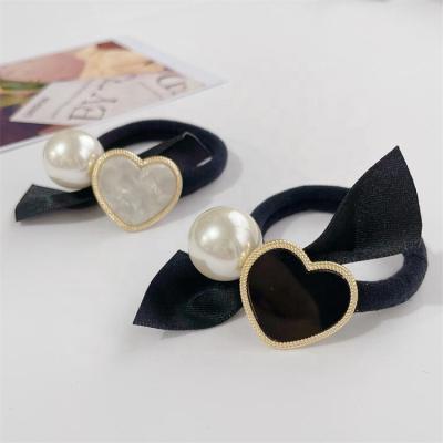 China Headdress tie ponytail hair rope 2023 Korean main hair accessories mirror love bow rope style fashion elegant women new for sale