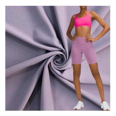 China Double Faced High-elasticity Spandex Polyester Quick Dry Fabric Recycled Stretch Fabric For Yoga Wear for sale