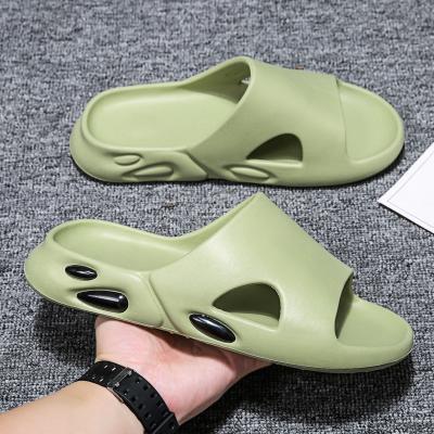 China New rubber coconut weathered slippers for summer indoor net infrared yeezy flip flops men's wear fashionable beach shoes for sale