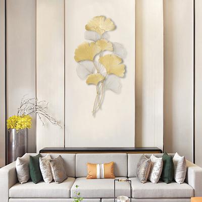 China Luxury Hanging Sofa Background Decoration Golden Metal Iron Ginkgo Leaf Minimalist Wall Home Decor Living Room for sale