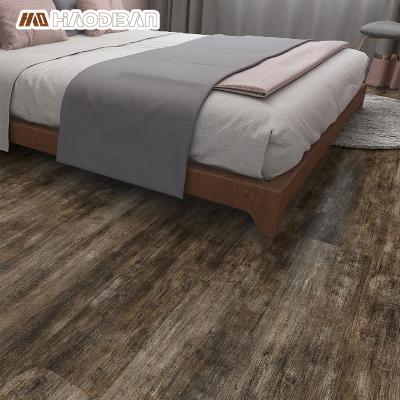 China Soft Underfoot Brown Wood Grain 0.3mm Wear Layer PVC LVT Flooring Vinyl Plank Skin And Stick Luxury Tile For Bedroom Home Office for sale