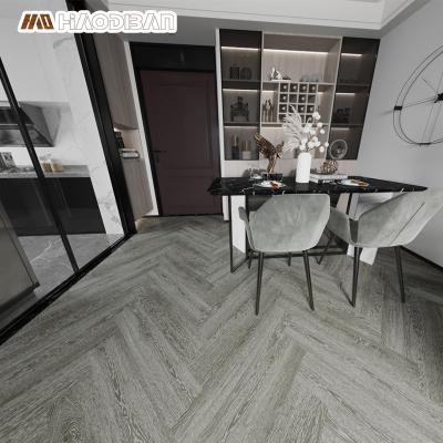 China Modern Scratch Resistance Smoked Gray Oak Herringbone Flooring Fishbone Style PVC Decor Plastic SPC Home Flooring for sale