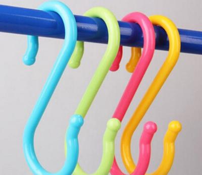 China New MOBILE S Shape Push Supporting Thick Plastic Hanger for sale