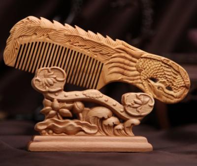 China Hot Selling Anti-static Carved Wooden Hair Comb Comfortable And Anti-Static for sale