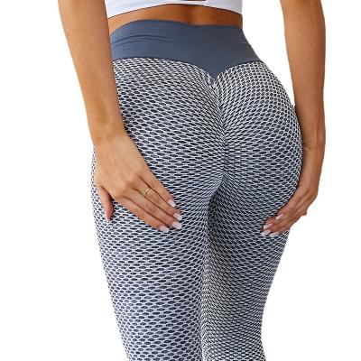 China Women's Breathable Jacquard Pants Ruched Butt Peach Hip Lifting High Waist Tight Hip Fitness Yoga Pants Sports Bubble Honeycomb Pants for sale