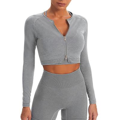 China Breathable Hot Selling Women Sports Fitness Solid Color Long Sleeves Zipper Up Seamless Yoga Cropped Top for sale