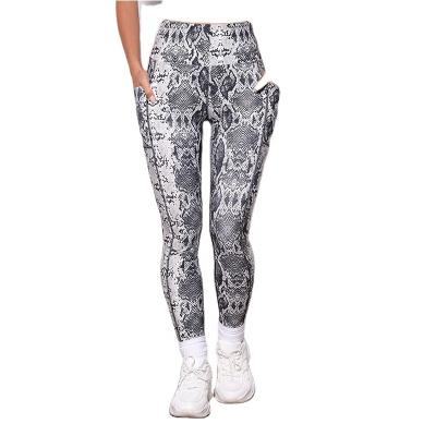 China Wholesale Breathable Lightweight 4 Way Stretch Side Pockets Snakeskin Yoga Gaiters Plus Size Training Wear for sale