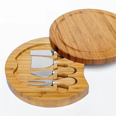 China Stocked High Quality Bamboo Cheese Board And Knife Set Around Charcuterie Board Cheese Board Set With Knives for sale