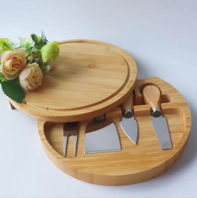 China Wholesale Bamboo Stocked Charcuterie Board Set Round Cheese Board With Knives for sale