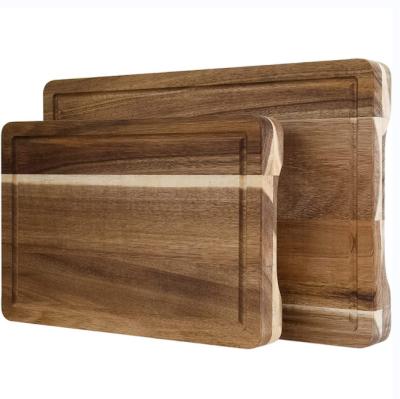 China Custom Wooden Chopper Stocked High Quality Wooden Chopping Plates with Handle Square Acacia Wood Chopping Board for sale