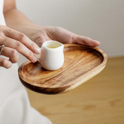 China Decorative Stocked Tray Acacia Wood Oval Shape Serving Tray For Coffee Tea Fruit Food Dessert Wooden Tray for sale