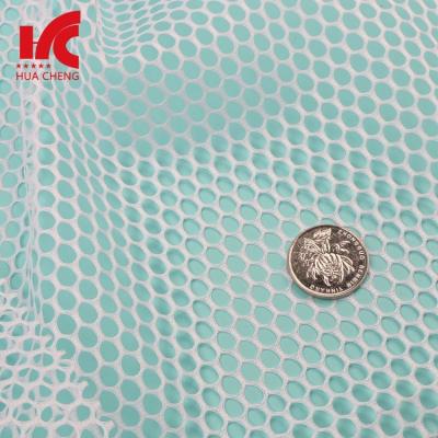 China Anti-Static Breathable Eyelet Midge Net Polyester Fabric Garment Roll for sale