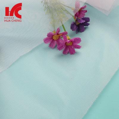 China 100% Polyester Fine Knit Mesh Fabric Wholesale Stiff Anti-Static Custom Hole for sale