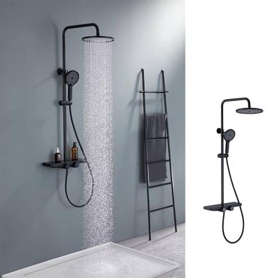 China With Slide Bar Black Shower Faucet Set Brass Hidden Hand Held Rain Shower Column With Shelf for sale