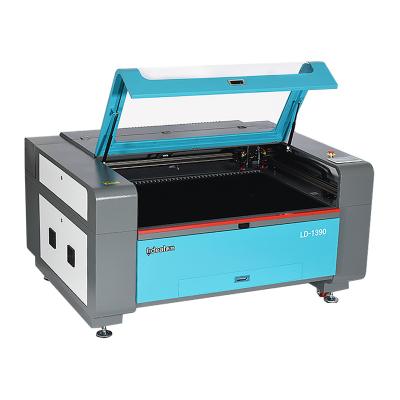 China Leather Laser CUT Glass Tube Water Cooling Paper Cloth MDF CO2 Laser Cutter Machine for sale