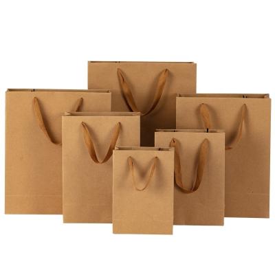 China Recycled materials 2022 hot sale custom logo eco friendly brown food take away kraft paper bag, shopping paper bag for sale