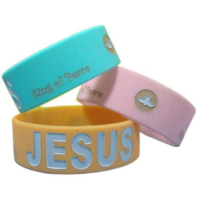 China Europe Debossed Logo And Text Theme Custom Glitter Silicone Wristbands for sale