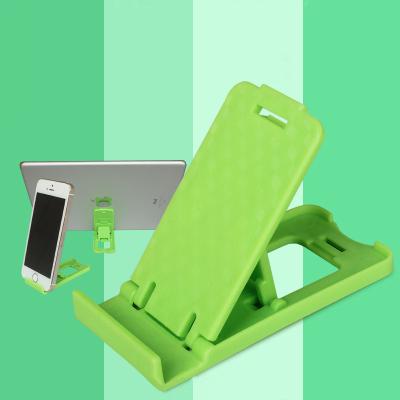 China Wholesale Adjustable Universal Plastic Mobile Phone Holder/Mobile Phone Desk Stand for sale