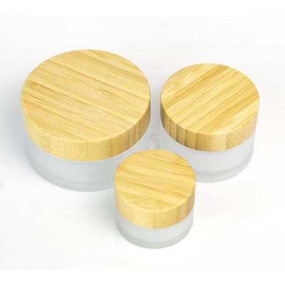 China ZHEJIANG 5G 10G15G 20G 30G 50G Frosted Cosmetic Packaging Container Black Glass Cream Jar Wood Lid New for sale