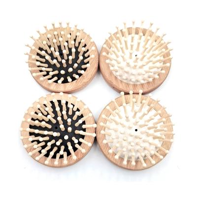 China Natural Wooden Mini Round Hair Comb Bamboo Pet Home Brush for sale