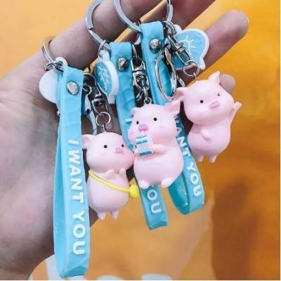 China South Korea Lovely Little Pig Simulation Keychains Resin Porket Raincoat Accessories Resin Pink Car Lovers Little Pig Gift Keychains for sale