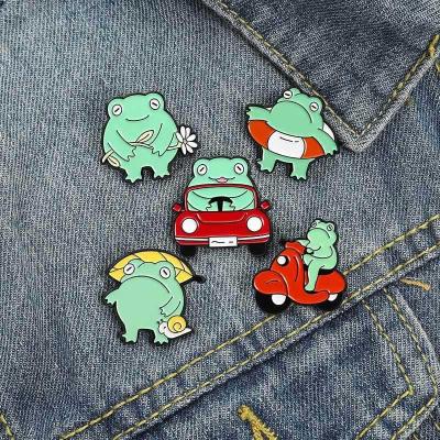 China Fashionable Cartoon Cute Student Ornaments Frog Car Covers Pin Drop Enamel Frog Guitar Brooch Wholesale Wholesale for sale