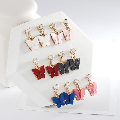 China TRENDY Best Selling Wild Sweet Color Zircon Acrylic Butterfly Earrings Korean Style Simple And Cheap Earrings Wholesale for sale