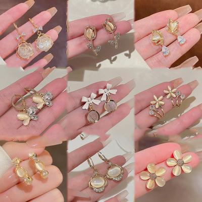 China TRENDY Simple Personality S925 Silver Needle Love Five-Pointed Star Alloy Earrings Female Pearl Earrings Tassel Earrings for sale