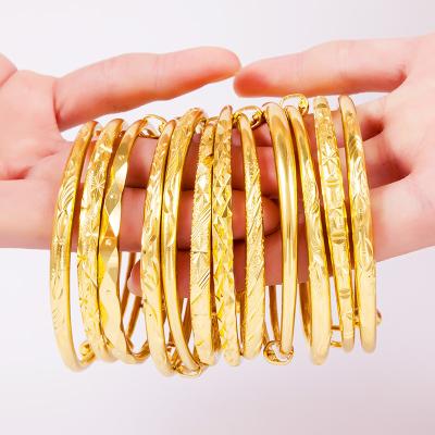 China TRENDY Wholesale Brass Gold Plated Gypsophila Push Pull Round Stem Bracelet Sand Gold Glossy Round Belly Bracelets Women for sale