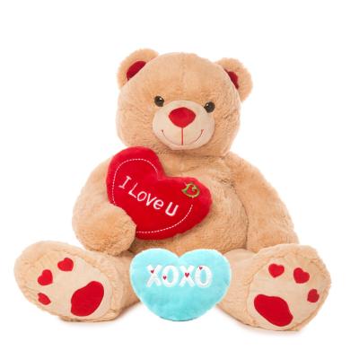 China Soft Plush Stuffed Plush Custom Sitting Teddy Bear With Embroidered Heart for sale