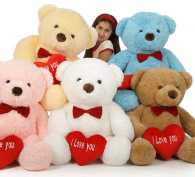 China Promotion Kids Toys Soft Happy Plush Stuffed Teddy Bear With Heart / Valentine's Day Popular Teddy Bear With Heart for sale