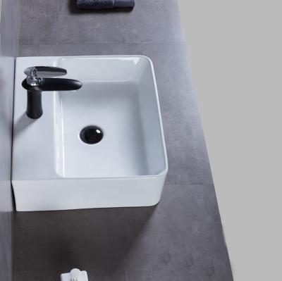 China Square Hole Modern Ceramic Small Edge Worktop Slim Art Basin With Faucet Bathroom Sinks for sale