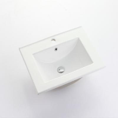 China Polished Edge Design Rectangle Design Popular Slim Narrow Bathroom Long Sink Bathroom Ceramic Hand Basin for sale